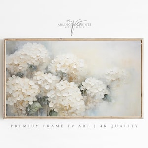 May include: A framed painting of white hydrangeas with a soft, watercolour-like background. The painting has a light, airy feel and is perfect for a modern or farmhouse style home.