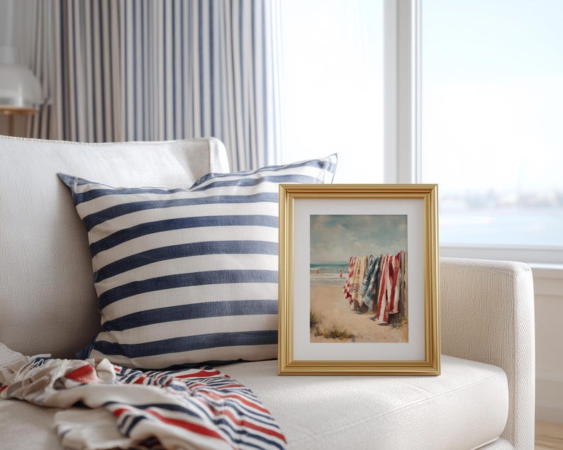 Beach scene with red, white, and blue towels hanging on a wooden fence, ocean waves and swimmers in the background. Coastal Americana style perfect for summer or 4th of July decor. Patriotic Beachy Wall Art, Coastal 4th of July PRINTABLE, Red White Blue Beach Towels, Vintage Summer Seaside Decor, Retro Americana Print