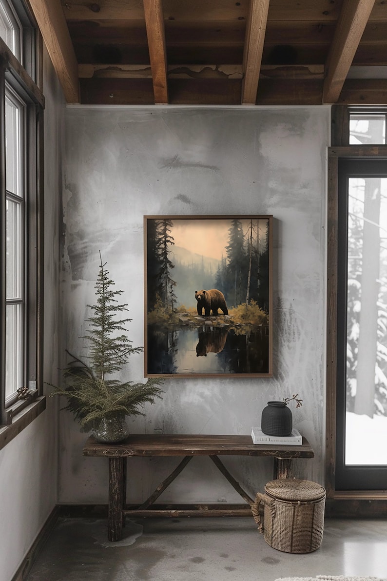 ustic wilderness-themed gallery wall featuring digital paintings of a bear by a lake, a crow on a branch, deer in misty woods, a cabin by the water, a leaping fish, and a foggy forest. Earthy tones and moody lighting create a serene, nature-inspired aesthetic perfect for lodge, cabin, or modern rustic decor.