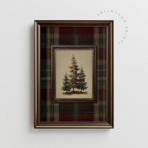 May include: A framed print featuring a watercolor painting of three evergreen trees. The inner frame is a dark brown, and the outer frame is a plaid pattern in shades of red, green, and brown. The text "ARLINGTON PRINTS" is visible.
