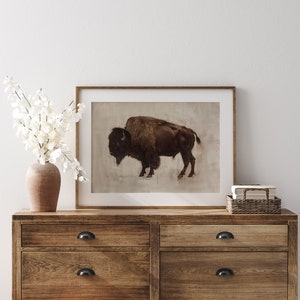 Digital painting of a lone bison standing proudly on a lightly textured background. Great for masculine decor, wildlife lovers, or rustic-themed rooms.