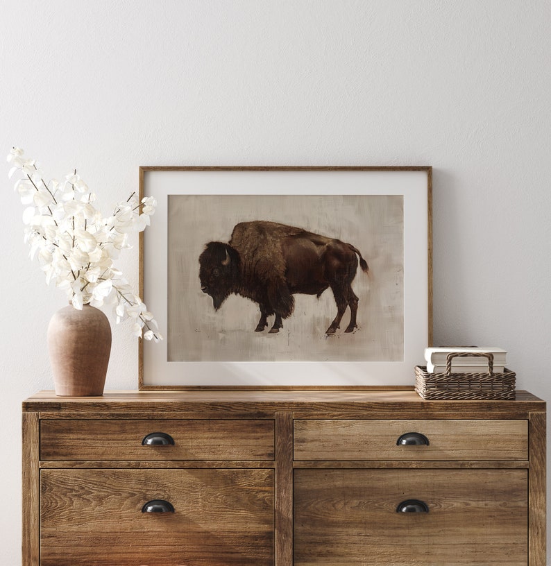 Digital painting of a lone bison standing proudly on a lightly textured background. Great for masculine decor, wildlife lovers, or rustic-themed rooms.