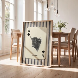 Downloadable western wall art featuring a black bull head inside an Ace of Spades playing card with “Made in the U.S.A.” text, styled with vintage country charm.