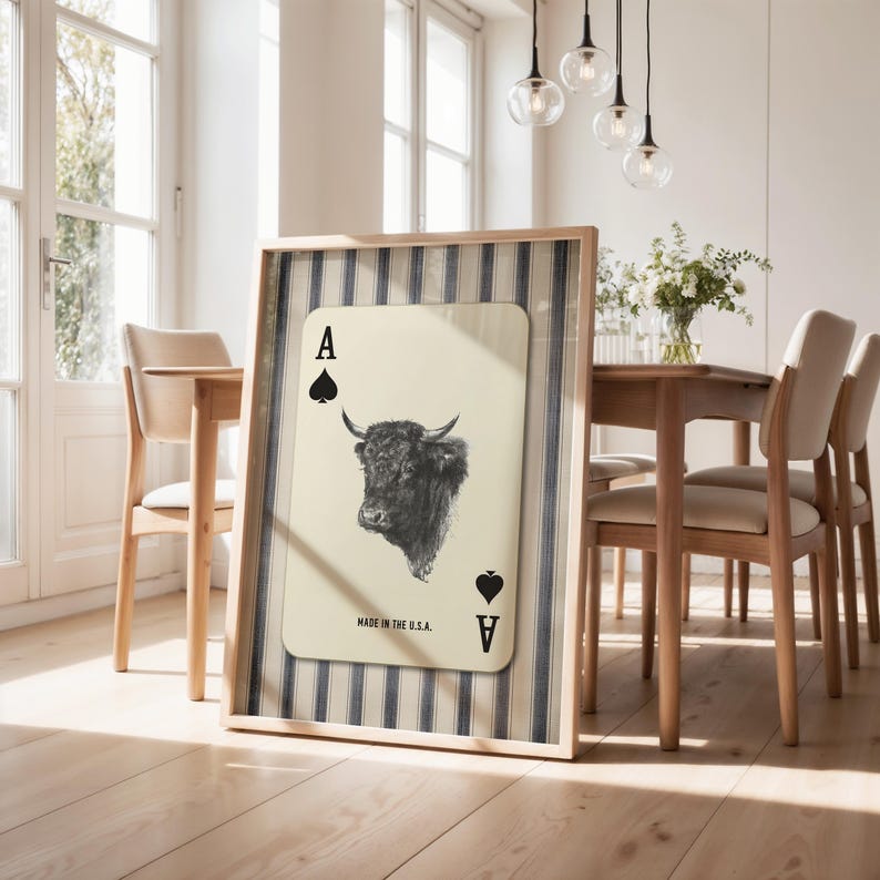 Downloadable western wall art featuring a black bull head inside an Ace of Spades playing card with “Made in the U.S.A.” text, styled with vintage country charm.