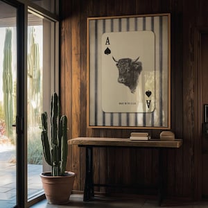 Downloadable western wall art featuring a black bull head inside an Ace of Spades playing card with “Made in the U.S.A.” text, styled with vintage country charm.