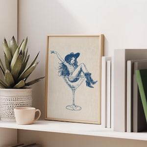 Retro Coastal Cowgirl Art, PRINTABLE Cocktail Wall Art, Girly Bar Cart Print, Coupe Glass Poster, Cute Apartment Poster, Dorm Room Print, 50s Vibe, Midcentury-Modern, Country Western Chic, Cowgirl Drawing, Digital Download Art, Navy Blue and Beige