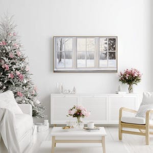 Samsung Frame TV art depicting a realistic painted window view of a serene winter landscape. Soft light filters through frosted glass panes, revealing snow-covered trees and a peaceful gray-and-white forest scene outside. The brushstrokes create a cozy, minimalist atmosphere perfect for modern farmhouse or winter home décor.