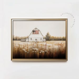 May include: A white farmhouse with a red, white, and blue American flag on the roof, set against a backdrop of a field of tall grass. The farmhouse is surrounded by trees and a blue sky.