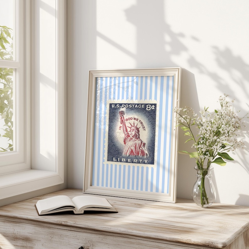 Vintage U.S. postage stamp wall art featuring the Statue of Liberty with patriotic colors and retro background, perfect for 4th of July or Americana decor.