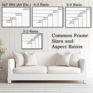 May include: A white couch with two white pillows in front of a white wall with black framed charts showing common frame sizes and aspect ratios in inches and centimeters. The charts are labeled with the aspect ratios 5x7 ISO (A4 Etc.), 4:3, 3:2, and 5:4.