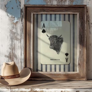 Downloadable western wall art featuring a black bull head inside an Ace of Spades playing card with “Made in the U.S.A.” text, styled with vintage country charm.