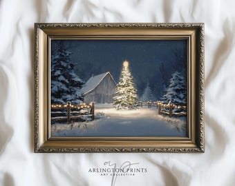 May include: Framed winter landscape art print featuring a snow-covered scene with a lit Christmas tree, a barn, and a wooden fence adorned with lights. The artwork is set in a gold-colored ornate frame. The text "ARLINGTON PRINTS ART COLLECTIVE" is visible.