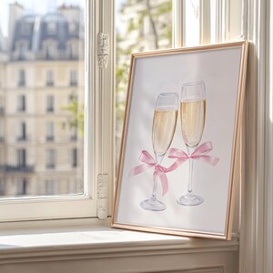 Two elegant champagne glasses filled with bubbly golden champagne, each tied with a soft pink satin ribbon, minimal neutral background, romantic celebration artwork