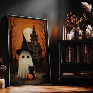 Vintage-style Halloween wall art featuring a cute ghost in a witch hat, a black cat with a glowing pumpkin, and a haunted house under a full moon. Perfect printable art for spooky and gothic Halloween decor.