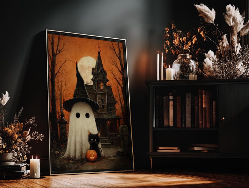 Vintage-style Halloween wall art featuring a cute ghost in a witch hat, a black cat with a glowing pumpkin, and a haunted house under a full moon. Perfect printable art for spooky and gothic Halloween decor.