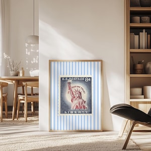 Vintage U.S. postage stamp wall art featuring the Statue of Liberty with patriotic colors and retro background, perfect for 4th of July or Americana decor.