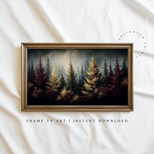 May include: A framed art print featuring a forest scene with tall evergreen trees in shades of gold, burgundy, and green. The artwork is set against a misty background, with the text "FRAME TV ART | INSTANT DOWNLOAD" at the bottom.