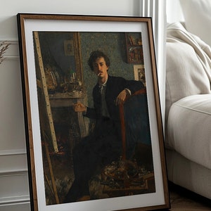 May include: A framed painting of a man in a dark suit sitting in a chair, holding a cigarette. The painting is set in a room with a fireplace and an easel in the background.