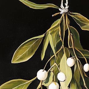 Printable mistletoe wall art with green leaves and white berries on a dark background, vintage rustic Christmas holiday print