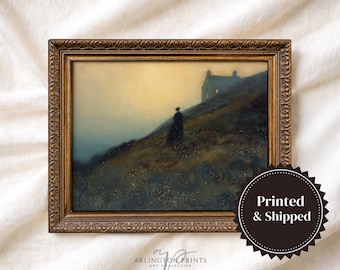 May include: A framed landscape painting in an ornate bronze-colored frame. The artwork depicts a solitary figure standing on a grassy hillside at dusk, with a small house visible on the horizon against a soft, hazy, golden-yellow sky.