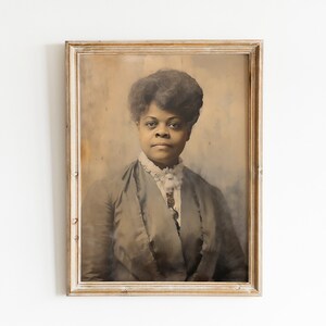 May include: Sepia-toned portrait of a woman in a vintage frame. The subject has dark hair and is wearing a dark jacket with a white lace collar. The frame is a light color with a distressed finish, adding to the antique aesthetic.