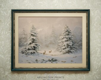 May include: Framed winter landscape art print featuring snow-covered evergreen trees and two deer in a snowy forest. The artwork is in a dark green and gold frame, with the text "ARLINGTON PRINTS ART COLLECTIVE" at the bottom.