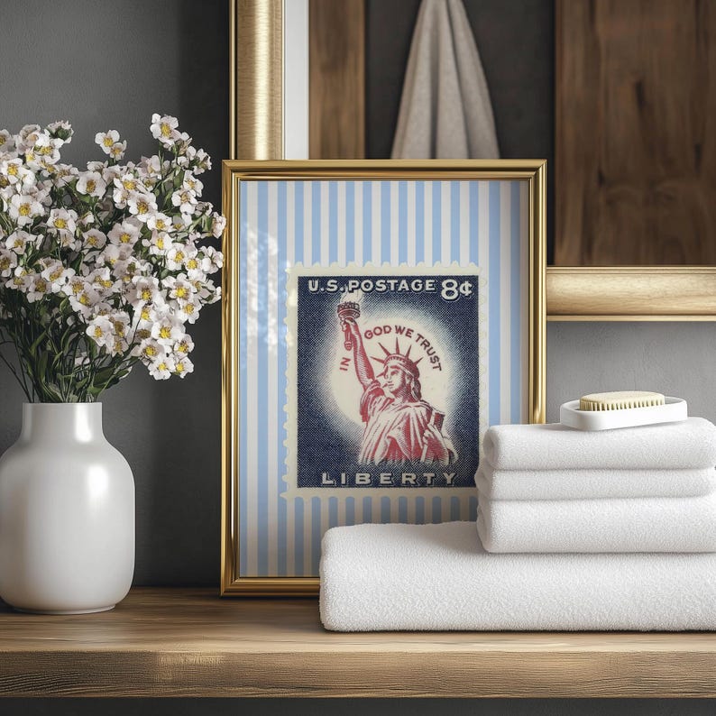 Vintage U.S. postage stamp wall art featuring the Statue of Liberty with patriotic colors and retro background, perfect for 4th of July or Americana decor.