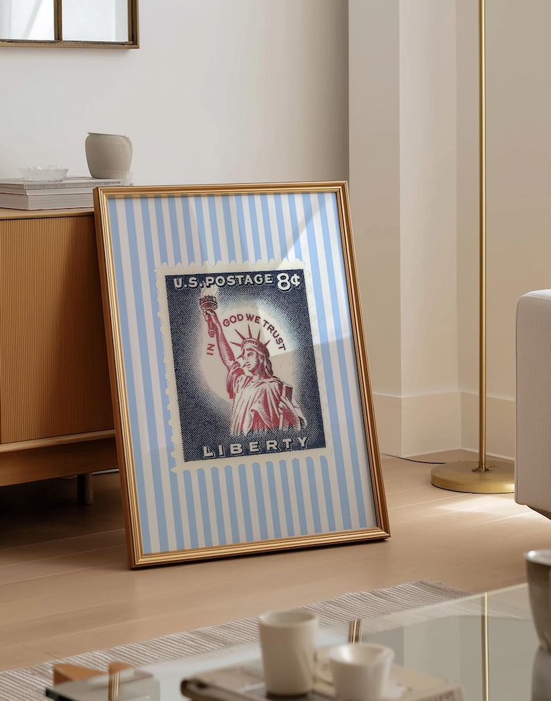 Vintage U.S. postage stamp wall art featuring the Statue of Liberty with patriotic colors and retro background, perfect for 4th of July or Americana decor.
