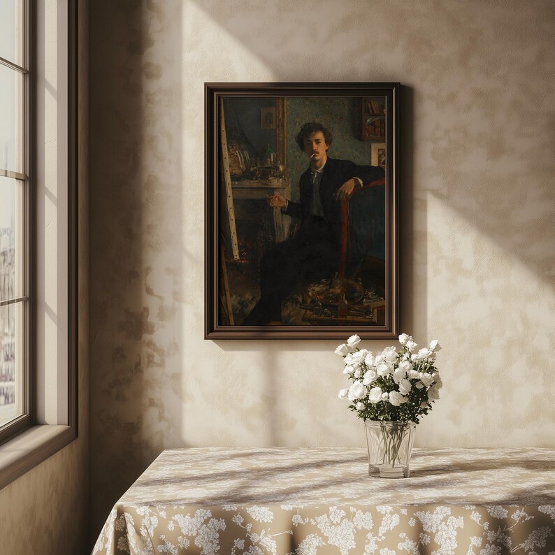 May include: A framed oil painting of a man in a dark suit sitting in a chair. The painting is set against a light beige wall with a white tablecloth and a vase of white flowers in front of it.
