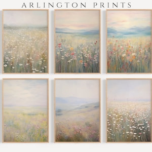 May include: Set of six framed art prints featuring abstract landscape paintings of a field of wildflowers in various shades of blue, green, and white. The prints are in simple wooden frames.
