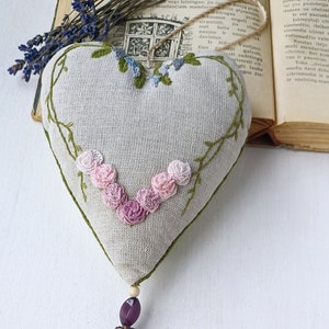 Hand embroidered linen sachet with tassel and hanging loop filled with lavender. Embroidered roses