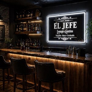 May include: A dimly lit bar with a wooden counter and three leather bar stools. A glowing sign reads "EL JEFE Lounge y Cantina" above the bar. Shelves behind the bar display bottles of liquor. A menu board lists classic cocktails.