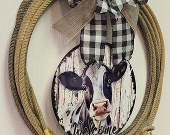 Lariat wreath with black and white cow