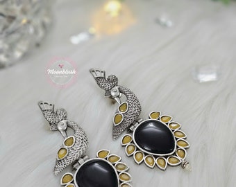 Dazzling Long earrings in unique pattern. Silver Replica with Monalisa Stones.