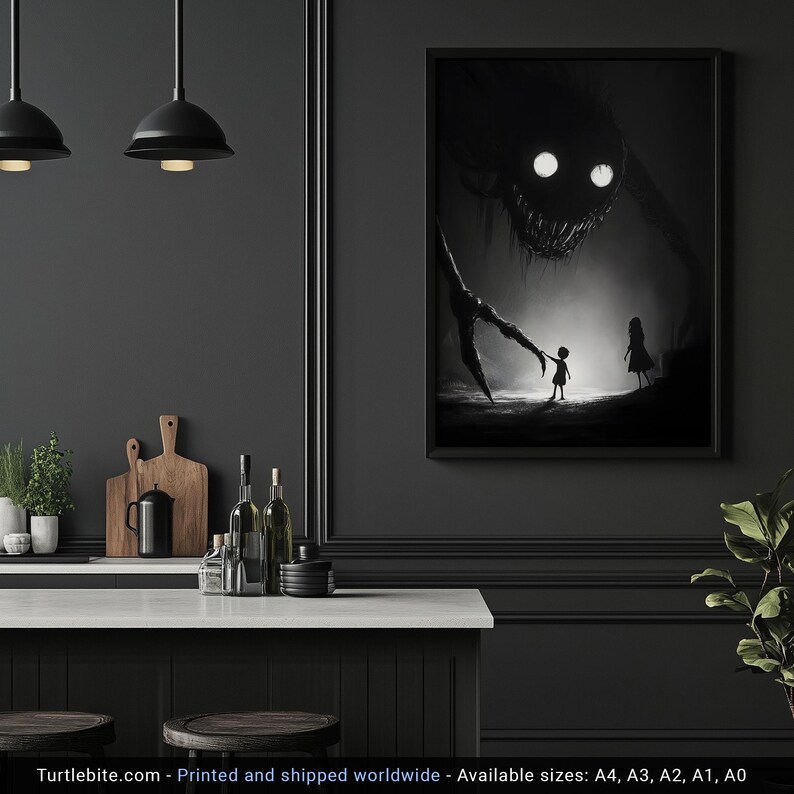May include: Black and white framed art print depicting a nightmarish creature with glowing eyes looming over two small figures. The artwork has a dark, ominous theme, with a focus on shadows and contrast. The print is displayed in a modern kitchen setting.
