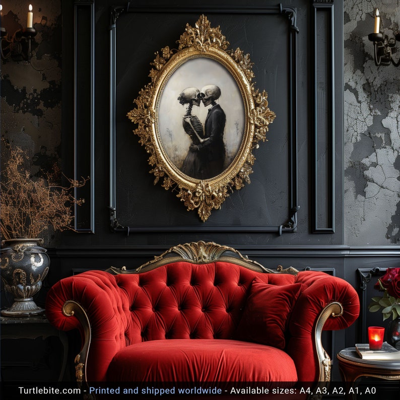 May include: An oval wall art print featuring two skeletons in an embrace, encased in an ornate gold frame. The artwork depicts a skeletal figure in a dress and a skeletal figure in a suit facing each other. The print is displayed on a black wall.