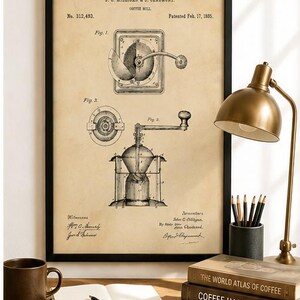 Vintage 1885 coffee mill drawing showing detailed technical views of an antique hand-crank coffee grinder and internal grinding mechanism on aged cream paper.