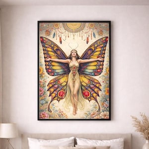 May include: A framed art print featuring a woman with butterfly wings. The artwork showcases a woman in a flowing gown with outstretched arms, adorned with large, colorful wings. The wings display shades of yellow, orange, red, and blue, with intricate patterns.