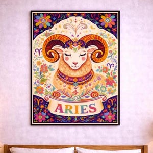 Peut inclure: Une affiche encadrée du signe astrologique du Bélier. L'œuvre représente un bélier orné de cornes incurvées, entouré de fleurs colorées. Le mot "ARIES" est inscrit sur une bannière. Les couleurs dominantes sont l'orange, le violet, le rose et le bleu.