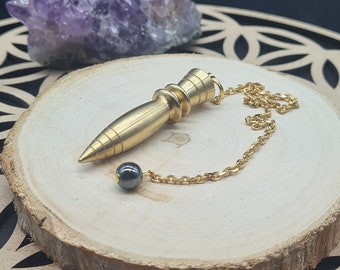 Mini thot pendulum in brass,