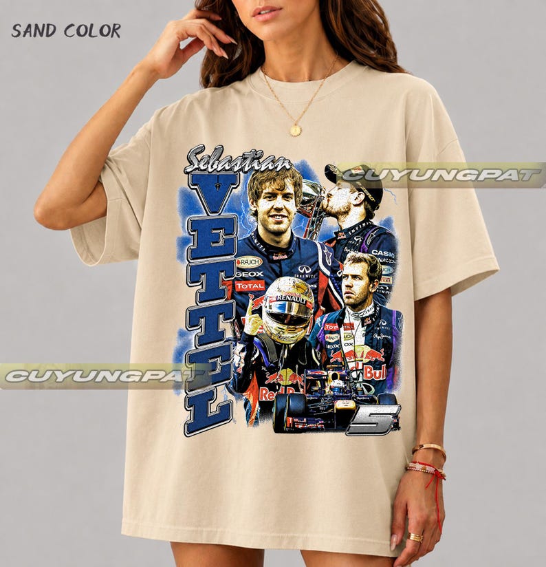 May include: A sand-colored short-sleeve t-shirt featuring a graphic print of Formula 1 driver Sebastian Vettel. The design includes multiple images of the driver, a racing helmet, a race car, the text "Sebastian VETTEL", and the number 5.