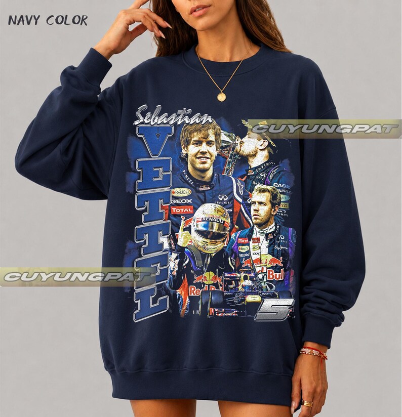 May include: A navy blue crewneck sweatshirt featuring a graphic print of Formula 1 driver Sebastian Vettel. The design includes multiple images of the driver in racing gear, the text "Sebastian VETTEL", the number "5", and "NAVY COLOR" text.