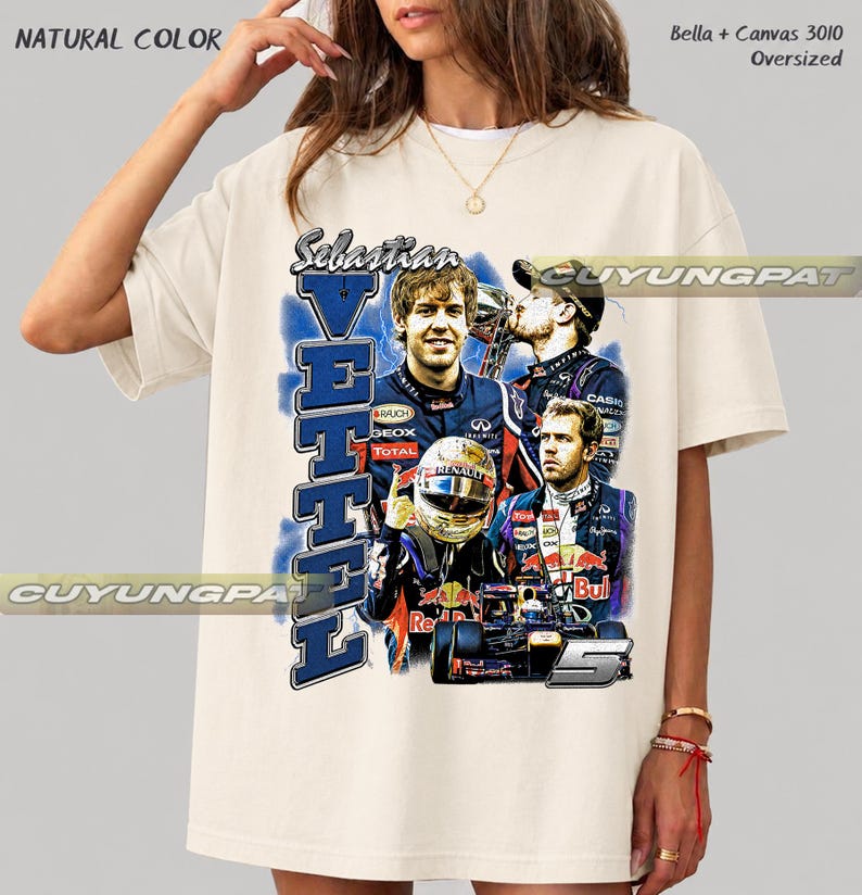 May include: A natural-colored oversized t-shirt featuring a graphic print of Formula 1 driver Sebastian Vettel. The design includes multiple images of the driver, a racing helmet, a race car, and the text Sebastian Vettel in blue and white.