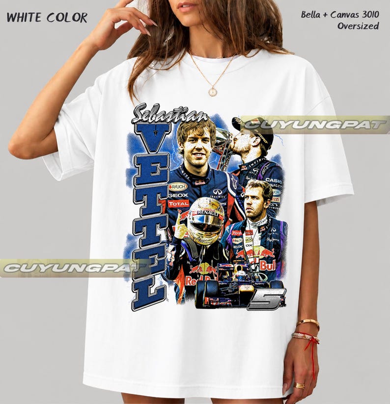 May include: A white oversized t-shirt featuring a graphic print of Formula 1 driver Sebastian Vettel. The design includes multiple images of the driver, a racing helmet, a race car, the text Sebastian Vettel, and the number 5. Text reads Bella + Canvas 3010.