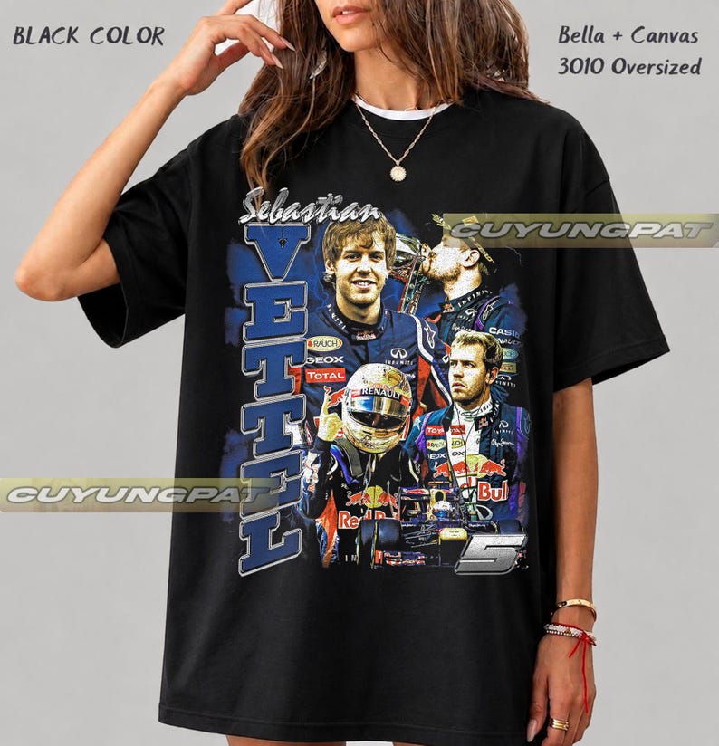 May include: A black oversized t-shirt featuring a graphic print of Formula 1 driver Sebastian Vettel. The design includes multiple images of the driver in racing gear, a helmet, a race car, the text "Sebastian VETTEL", and the number 5.