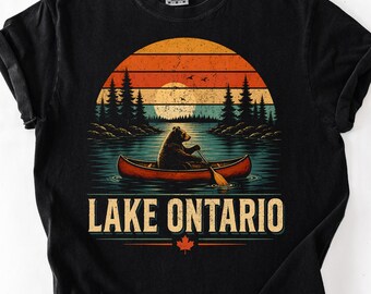 T-shirt met afbeelding van het Ontariomeer (Grote Meren), vintage Comfort Colors Ontario-shirt, retro T-shirt met zonsondergang en beer in een kano, ideaal cadeau voor buitenactiviteiten zoals wandelen, kamperen en reizen.