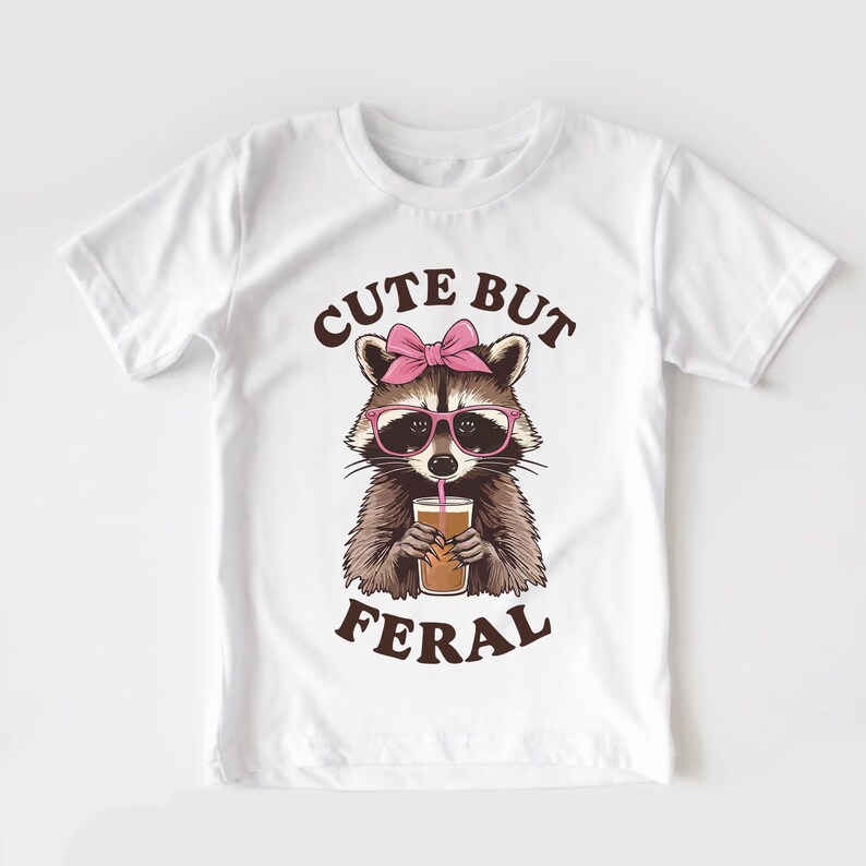 Cute But Feral Raccoon Toddler Shirt, Funny Raccoon Boy Girl Gift, Trash Dweller Animal Tee, Somebodys Feral Child, Natural Kids & Youth Tee
