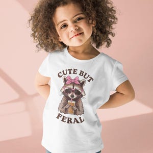 Cute But Feral Raccoon Toddler Shirt, Funny Raccoon Girl Gift, Trash Animal Tee, Somebodys Feral Child, Natural Kids Youth Tee, Girls Gift