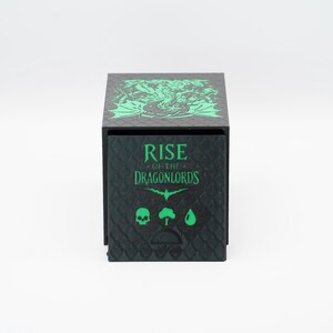 May include: Black box with green accents and the text "RISE OF THE DRAGONLORDS." The top of the box features a green dragon design. The front of the box has a skull, tree, and water drop symbol.