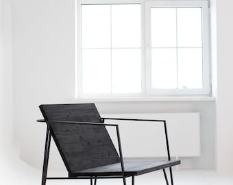 Sillón de madera negro